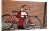 Boy Cleaning His Bike by Anonymous