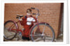 Boy Cleaning His Bike by Anonymous