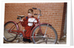 Boy Cleaning His Bike by Anonymous