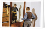 Boy Trying on Cowboy Duds by Anonymous