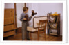 Boy Looking at Cowboy Boots by Anonymous