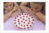 Children Eying Raspberry Dessert by Anonymous
