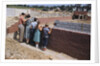 Family Observing a School Construction Site by Anonymous