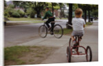 Boys Riding Their Bike and Tricycle by Anonymous