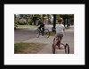 Boys Riding Their Bike and Tricycle by Anonymous