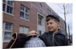 Boy Standing in Schoolyard by Anonymous