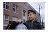 Boy Standing in Schoolyard by Anonymous