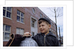 Boy Standing in Schoolyard by Anonymous