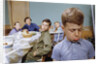 Boy Pouting near the Dinner Table by Anonymous