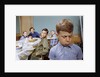 Boy Pouting near the Dinner Table by Anonymous