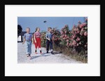 Children Walking Along Gravel Road by Anonymous