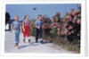 Children Walking Along Gravel Road by Anonymous