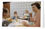 Mother and Daughter Conversing at Dinner Table by Anonymous