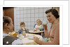 Mother and Daughter Conversing at Dinner Table by Anonymous