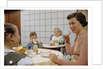 Mother and Daughter Conversing at Dinner Table by Anonymous