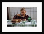 Boy Eating a Slice of Cake by Anonymous