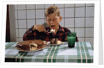 Boy Eating a Slice of Cake by Anonymous