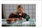 Boy Eating a Slice of Cake by Anonymous