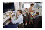 Family Cleaning the Dishes by Anonymous