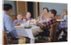 Family Eating at the Dinner Table by Anonymous