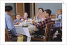 Family Eating at the Dinner Table by Anonymous