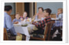 Family Eating at the Dinner Table by Anonymous