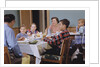Family Eating at the Dinner Table by Anonymous