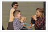 Boys Eating Hot Dogs by Corbis