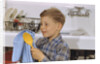 Boy Drying Serving Spoon by Anonymous