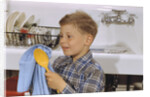 Boy Drying Serving Spoon by Anonymous