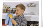 Boy Drying Serving Spoon by Anonymous