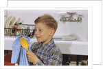 Boy Drying Serving Spoon by Anonymous