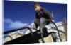 Boy Playing on Playground Slide by Anonymous