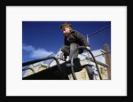Boy Playing on Playground Slide by Anonymous