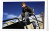 Boy Playing on Playground Slide by Anonymous