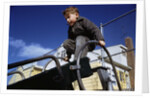 Boy Playing on Playground Slide by Anonymous