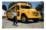 School Bus Dropping off Child at Home by Anonymous