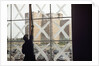 Man Cleaning Windows near Housing Project by Anonymous