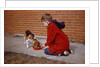 Boy Feeding Dog on Sidewalk by Anonymous