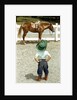Young Cowboy Looking at Horse by Anonymous