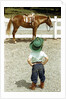 Young Cowboy Looking at Horse by Anonymous