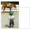 Young Cowboy Looking at Horse by Anonymous