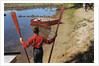 Boy Holding Oars by Anonymous