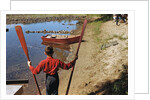 Boy Holding Oars by Anonymous