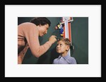 Mother Measuring Boy's Height by Anonymous