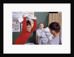 Siblings Having Pillow Fight by Anonymous