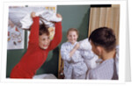 Siblings Having Pillow Fight by Anonymous