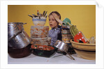 Boy Overwhelmed by Dirty Dishes by Anonymous