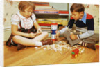 Boy and Girl Playing with Tinkertoys by Anonymous