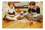 Boy and Girl Playing with Tinkertoys by Anonymous